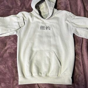 like new crewneck hoodie very unnoticeable stain on back no tears